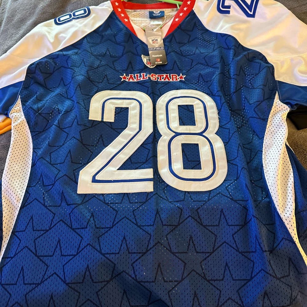 Adrian Peterson pro bowl authentic Jeresy and authentic Hines Ward superbowl.